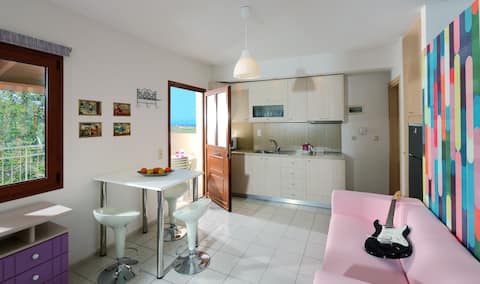 Charming retro studio with shared pool and view