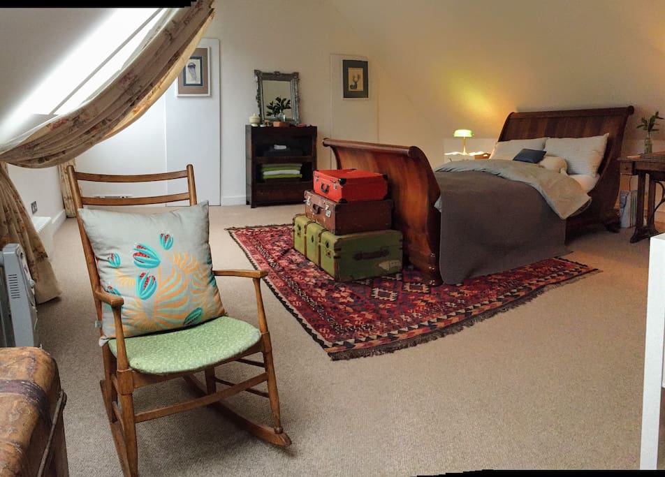The master 'Alice Bedroom' occupies the whole footprint of the cottage, on the top floor with private sitting and library area; with views over the treetops to the fells... Review: "One of the best Airbnb's I have ever stayed in."