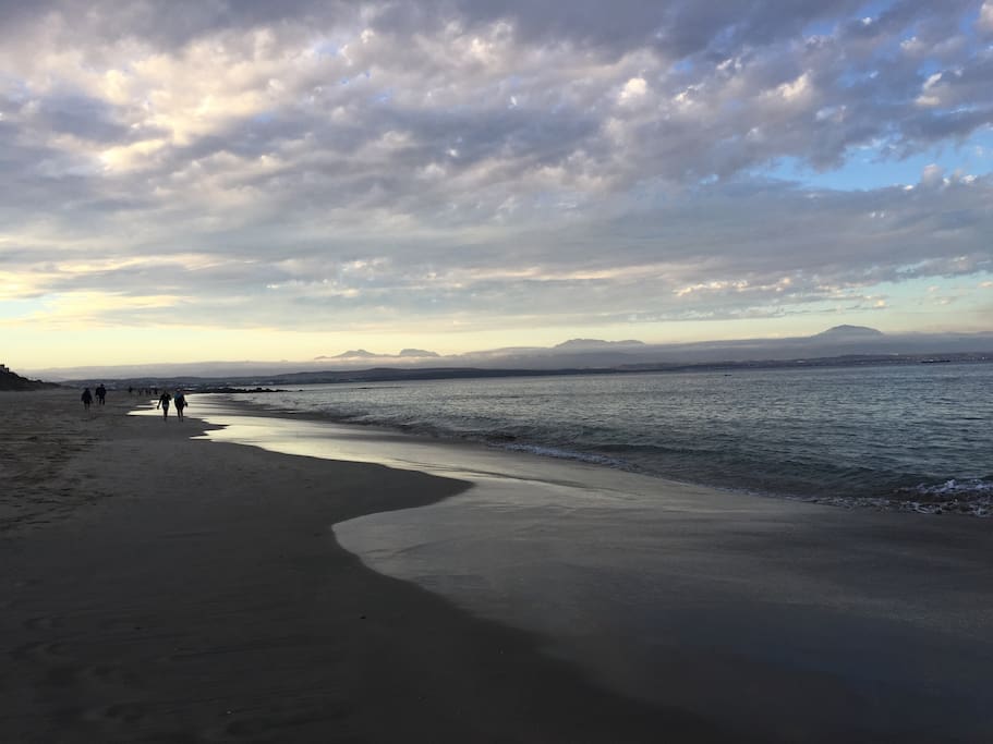 Sunset walks along Santos beach