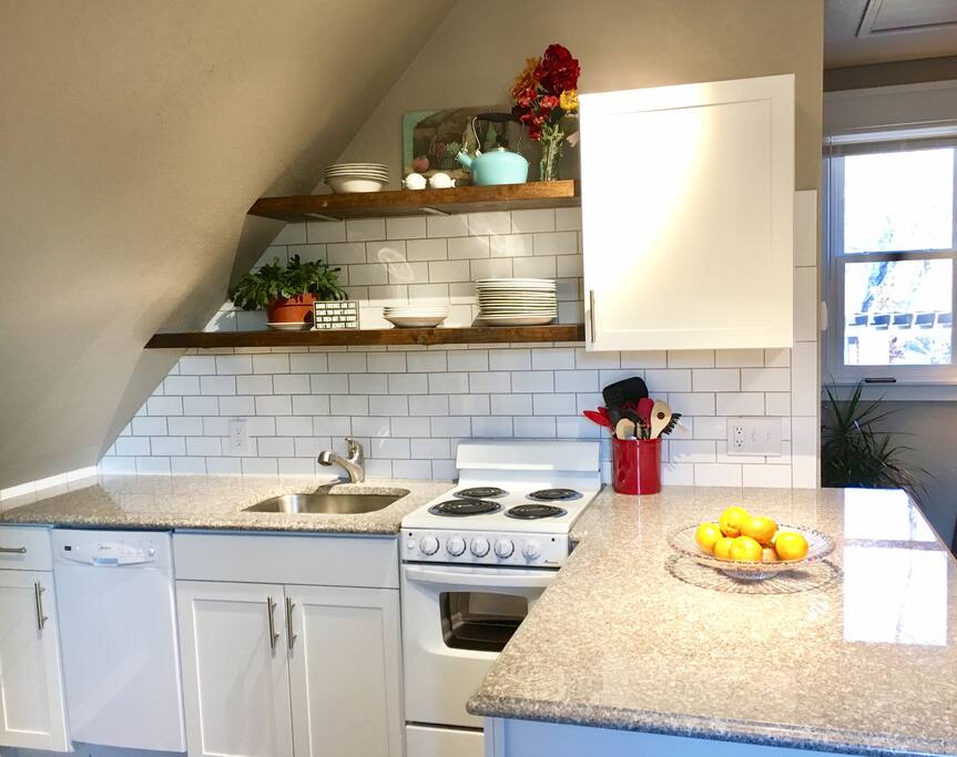 Brand new cabinets, countertops, stove, and dishwasher!