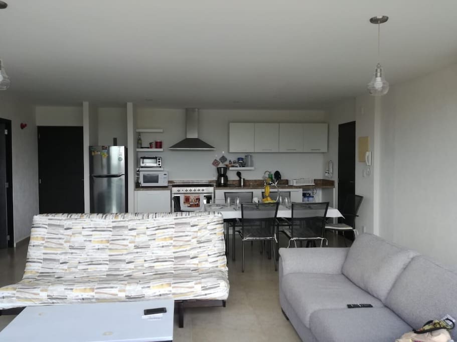 Kitchen, dining area, and living room