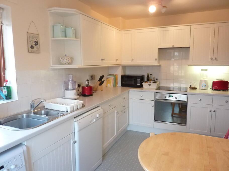 The kitchen also features all of the cooking tools and appliances a group needs.