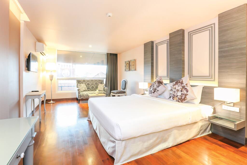 A private hotel room with natural light