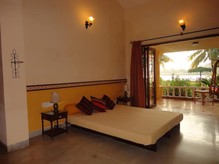 Bedroom 2 has French windows leading to the terrace, and has a lovely view of River Sal