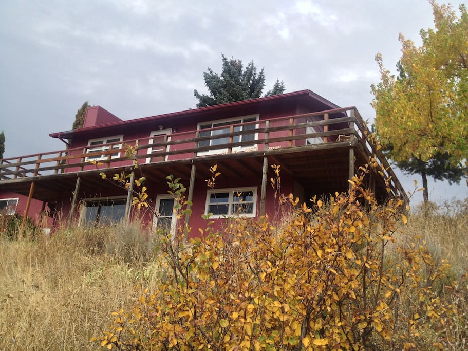 The home is located on a beautiful south facing hillside at the mouth of Fox Creek Canyon.
