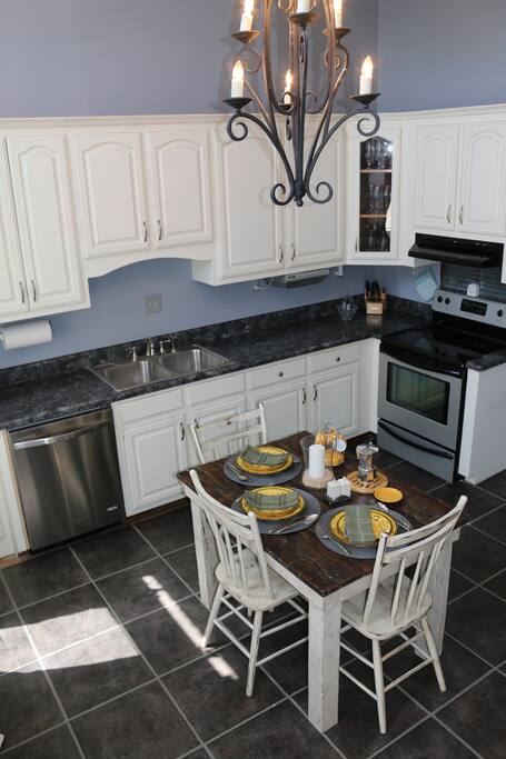 Kitchen with 12' ceilings and attached laundry room