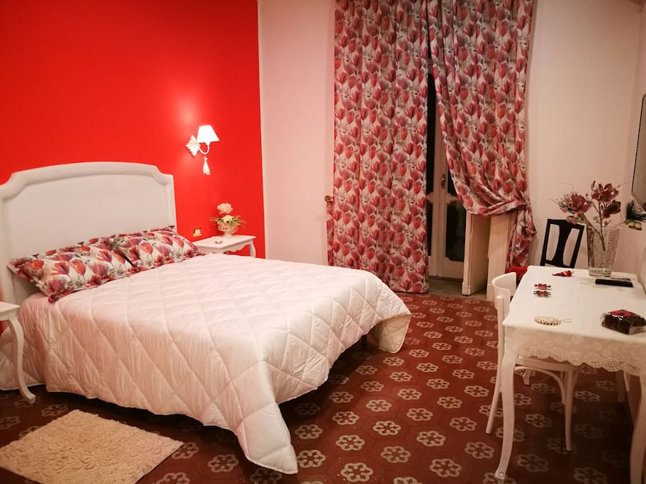 Camera con letto matrimoniale e letto singolo