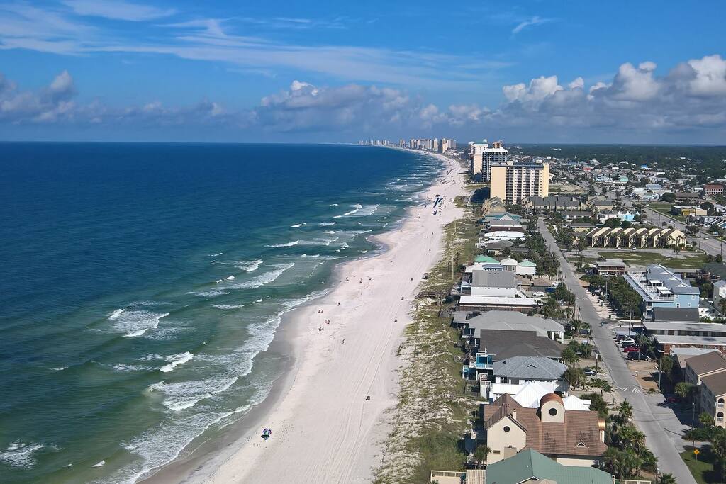 View from balcony down the beach