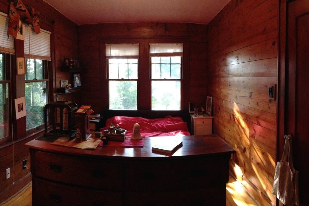 Quieter bedroom in the back of the house with semi-private bathroom.