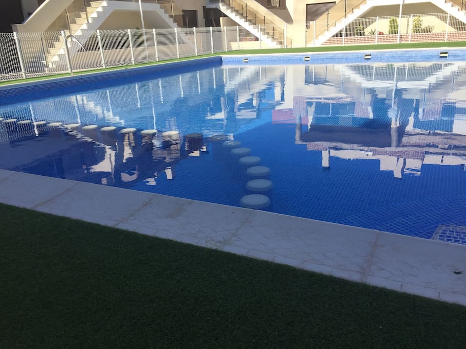 Communal pool right outside the back door with child safe area