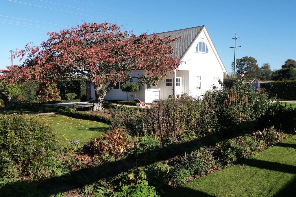 The studio apartment is located in the top story of our garage separate from the main house