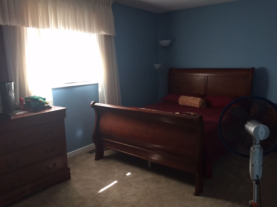 Bedroom 2, Queen size, large closets, quiet backyard view