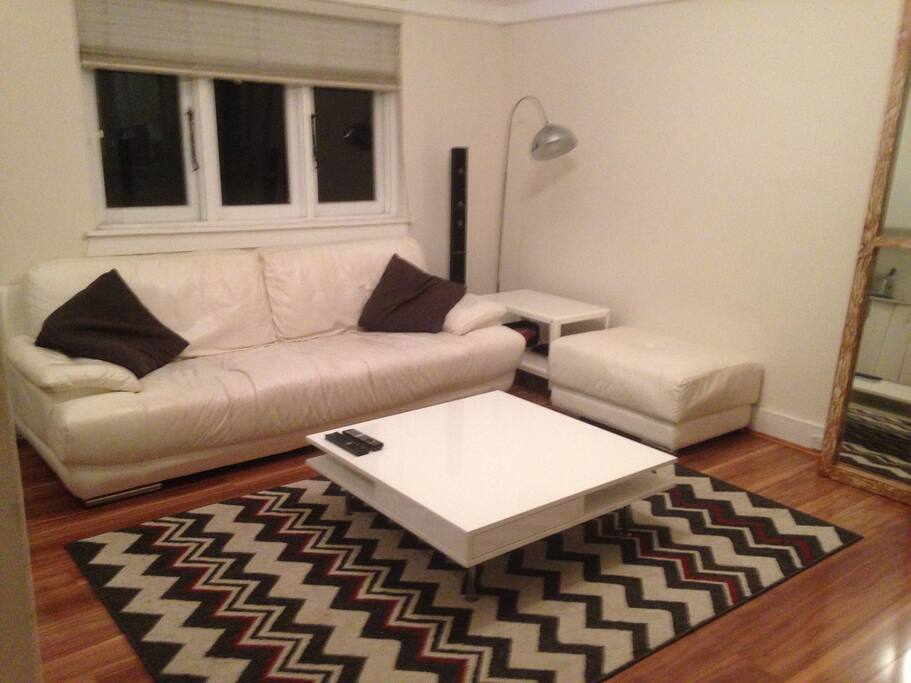 Beautiful spacious living room with leather lounge