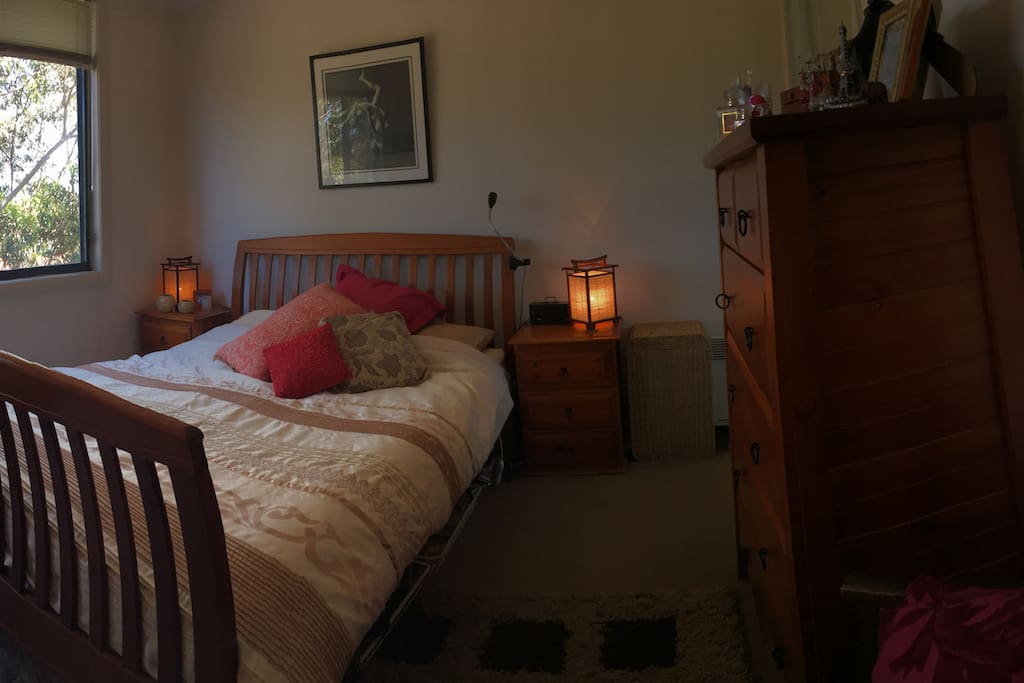The master bedroom with ensuite around the corner on top landing... and a gorgeous outlook of gum trees from the 3rd floor with the large window. You will love waking up to this! The window is the length of the whole wall.. but was cut off in the panorama upload :(
