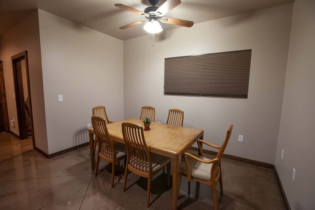 Attached dinning room with table and chairs.