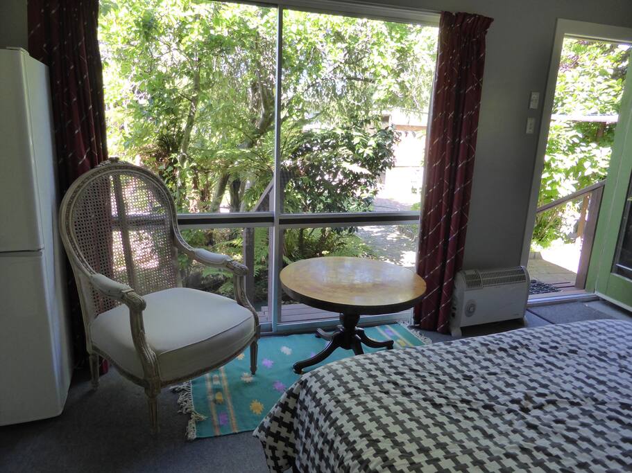 View from bedroom into garden. Quite private. Fridge available to use.