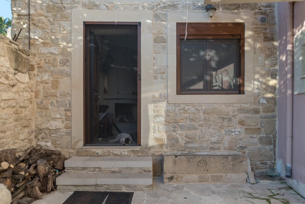 Outside, small yard, facing to the entrance