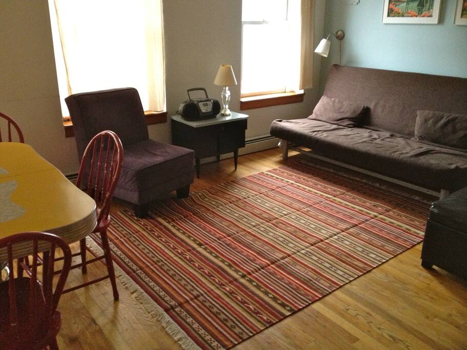 Apartment runs front to back in this building- lots of natural light.