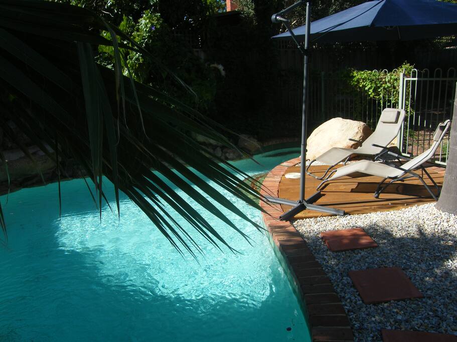 Gorgeous pool area with decking area to sunbake