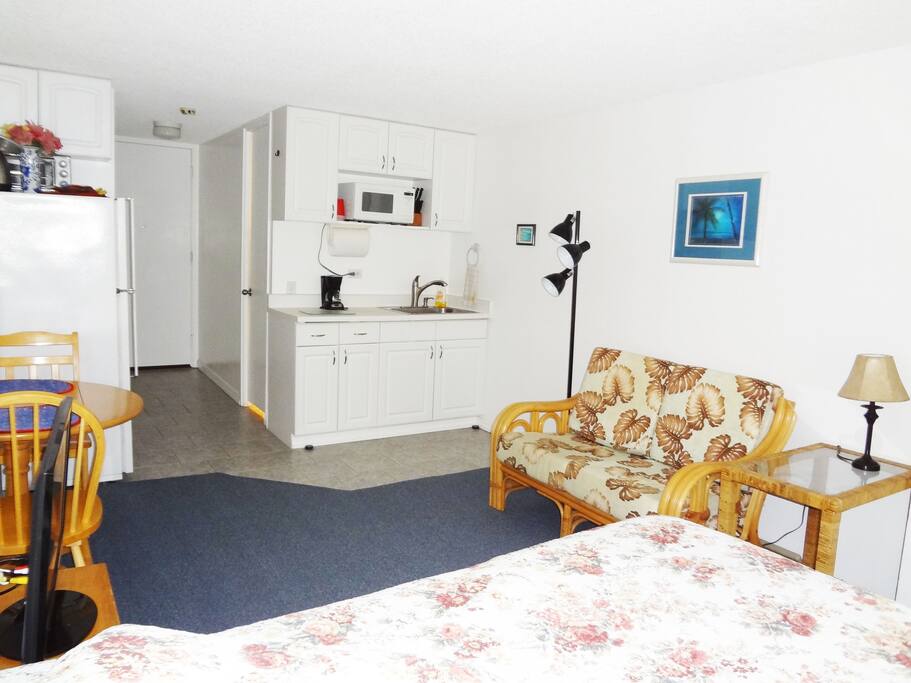 Plumeria kitchen area. 5 foot counter with sink, upper and lower cabinets, micro, hotplate, toaster oven.