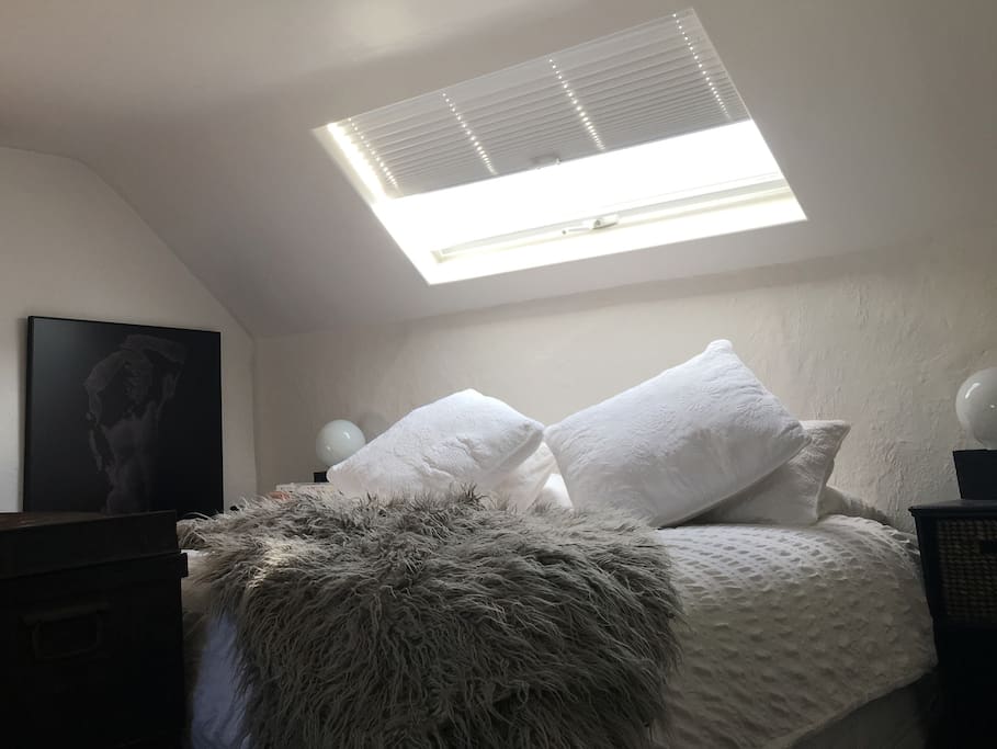 Attic bedroom with king bed