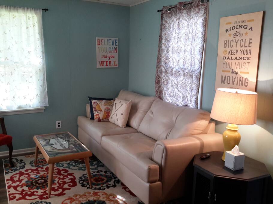 New queen size sleeper couch pulls out for a larger party of guests.