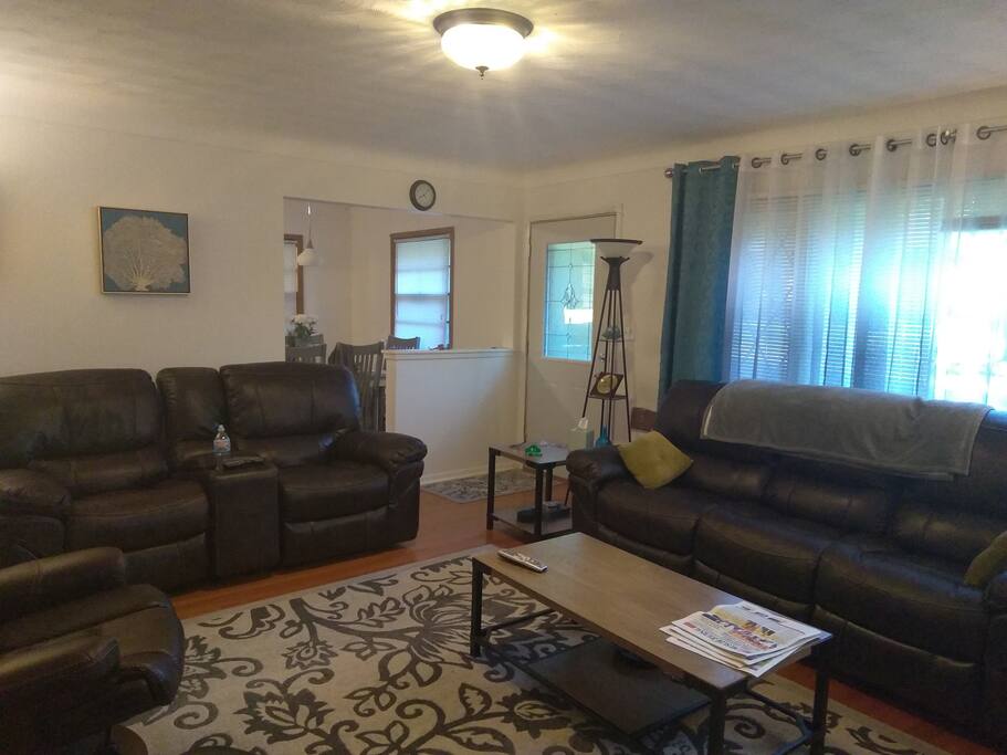 cozy living room with a fireplace! enjoy wifi and cable TV.
