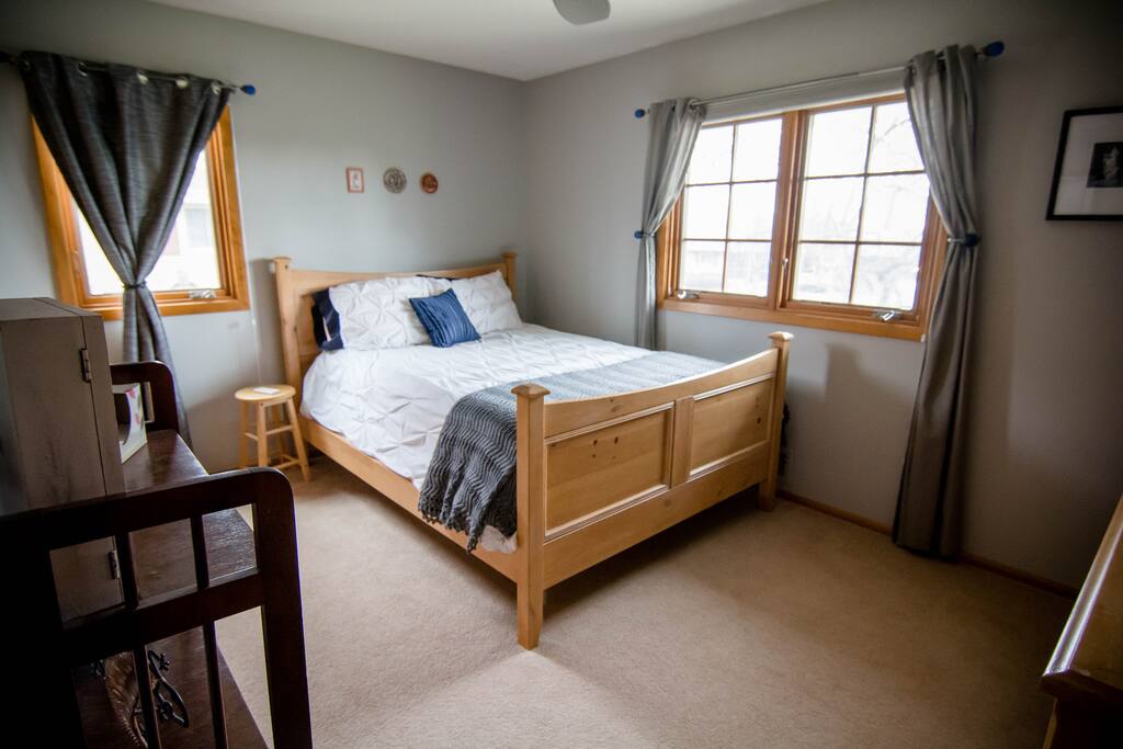 Private room with a queen-sized bed.