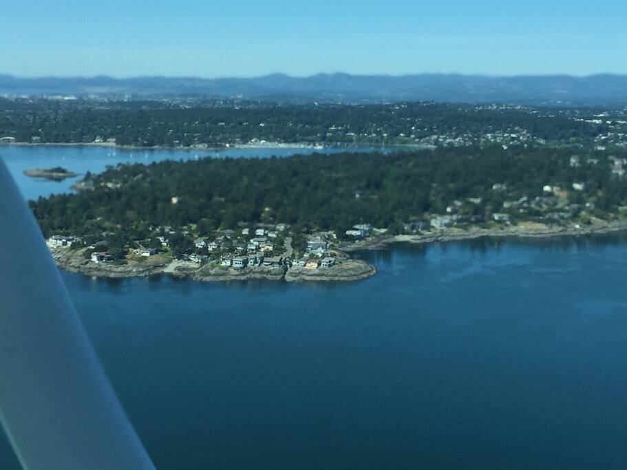Aerial view of our neighbourhood in fore ground and Gyro Park beach in the background.