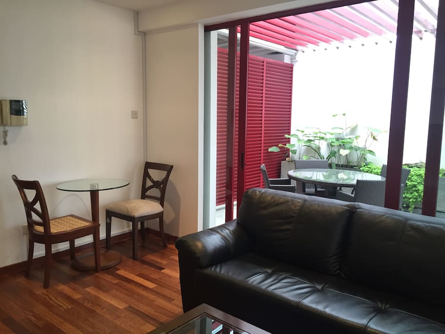 Small indoor dining table for two in a cost corner