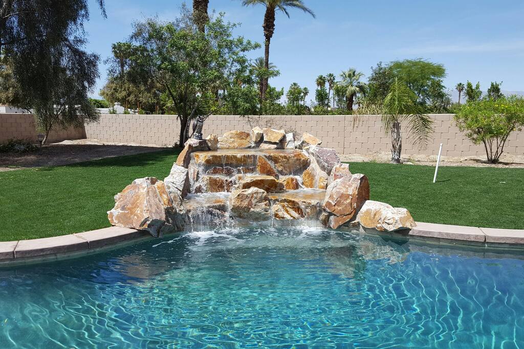 Sit under the waterfall and enjoy the running water.