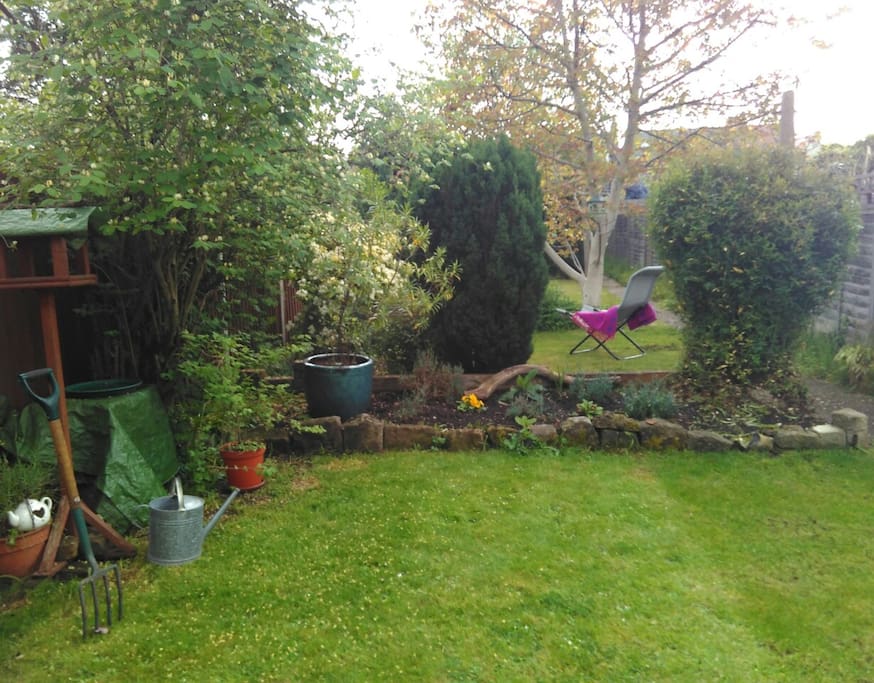Patio garden with garden chairs, garden umbrella ect