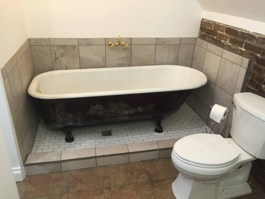 Antique 6 foot long cast iron soaking tub