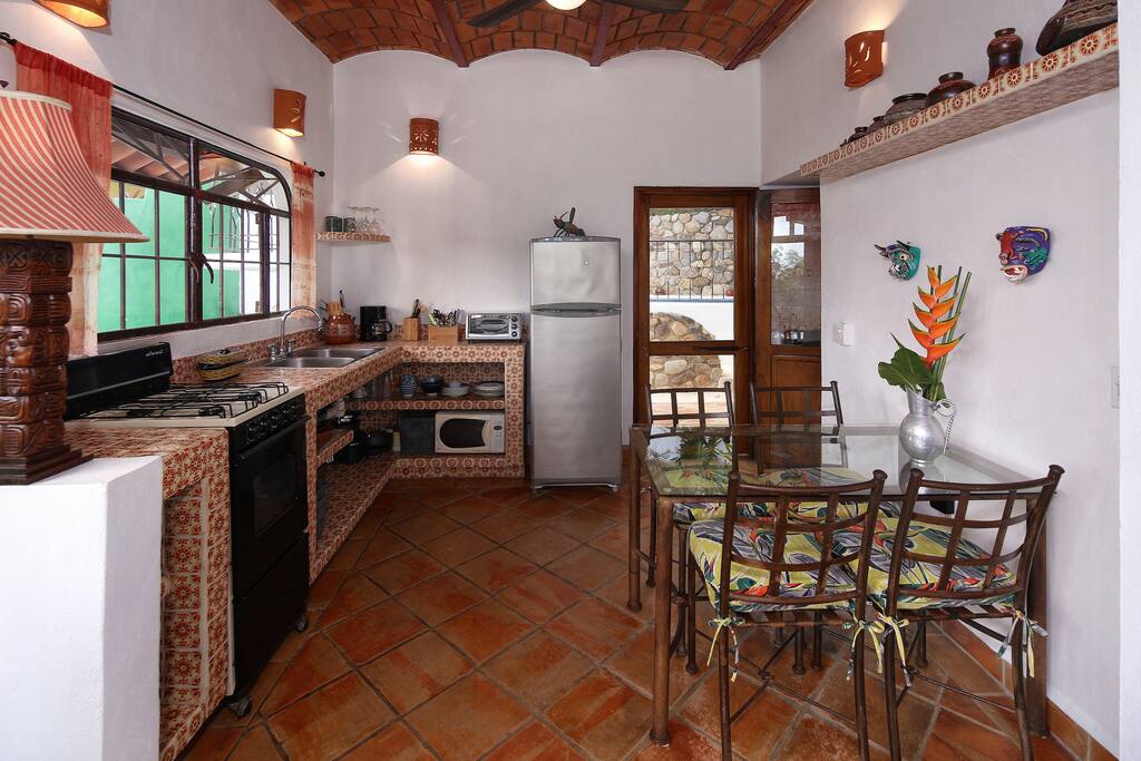 Kitchen opens up to pool area