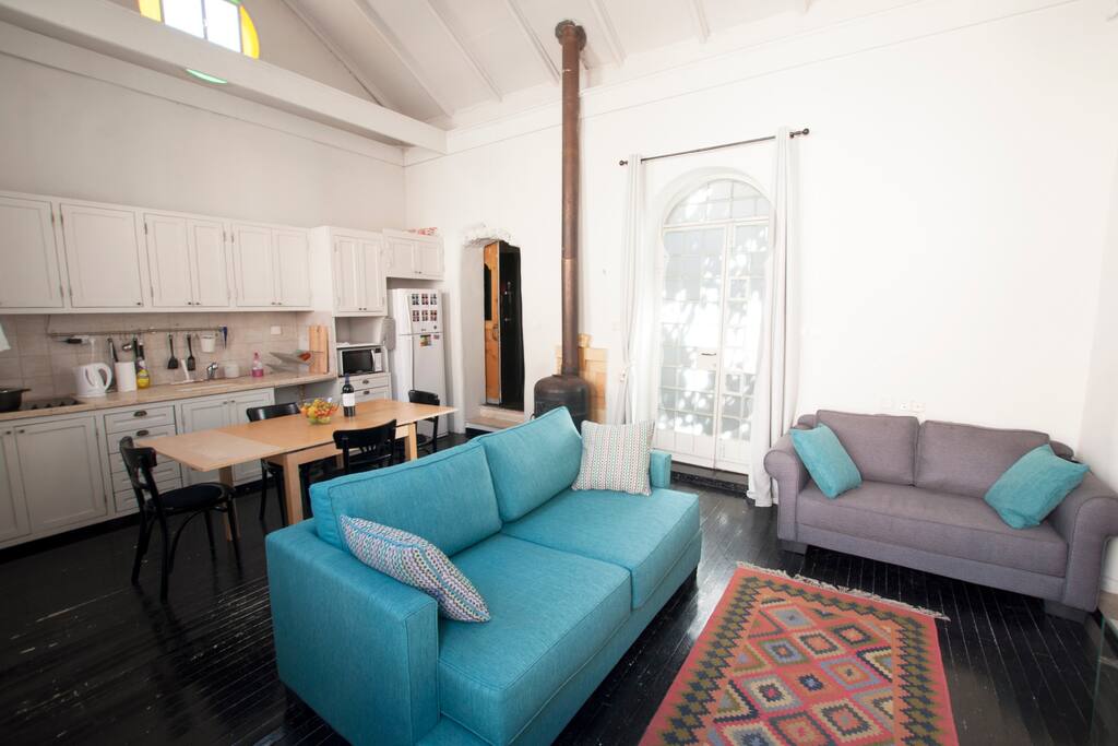 Very nice living room with this sofa bed (30m² and 5m ceiling height)
