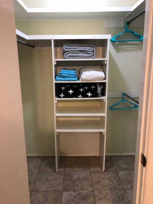 Walk in closet in bedroom