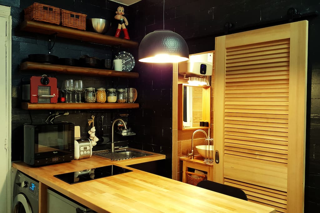 Delicately decorated kitchen with Wood and Black design concept .