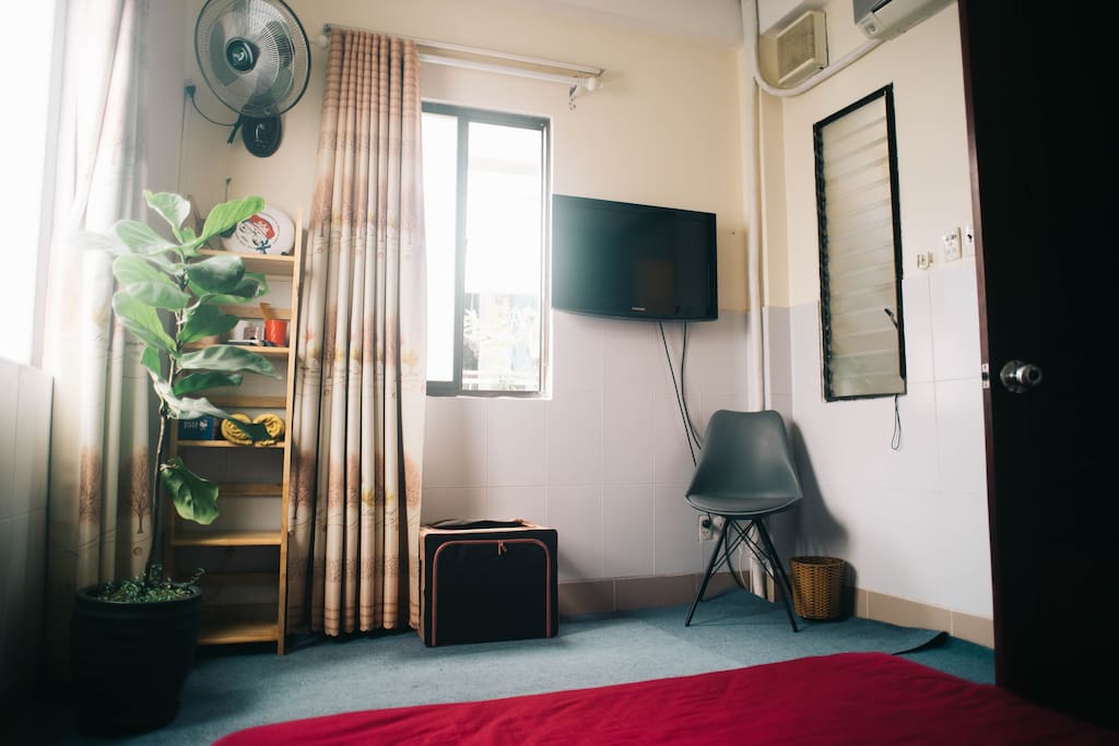 As in any room, you have a chair, and 2 pairs of slippers to walk in the house. The floor is covered, and we about to move the Flat TV on a proper drawer so it looks better. Putting a TV on the wall in a corner is a crime we can not tolerate.
