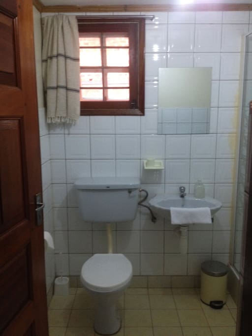 Clean and spacious bathroom. Towels and TP provided for free