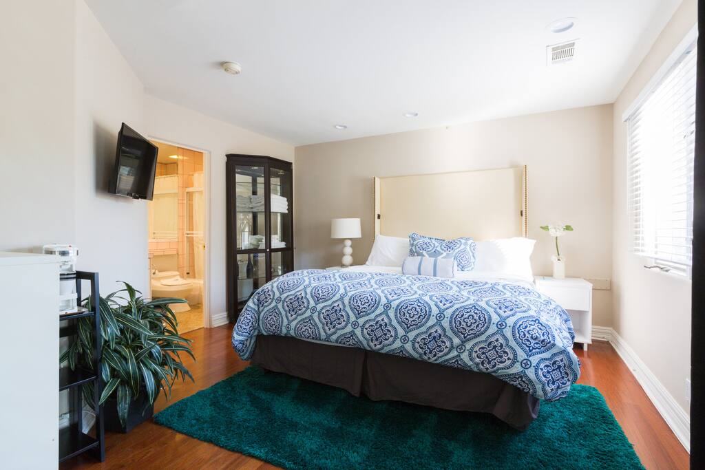 Suite 1: Villa Suite, 2-room suite on main floor. King plus single bed and sofa-futon.