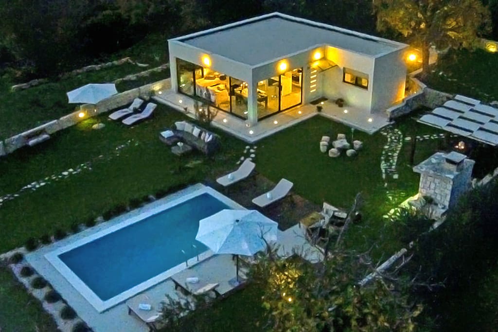 Villa exterior by night in Split on large private land