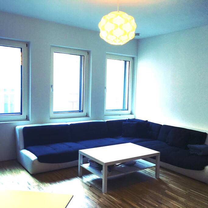 living room with huge sofa