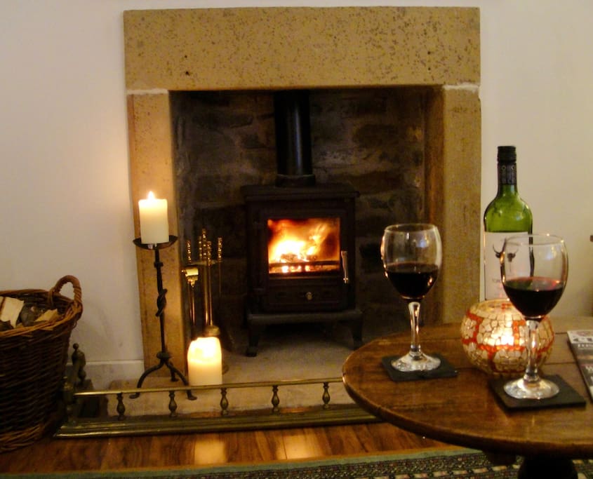 Snuggle up in the evening by candlelight in front of the log-burner, with cosy throws provided.