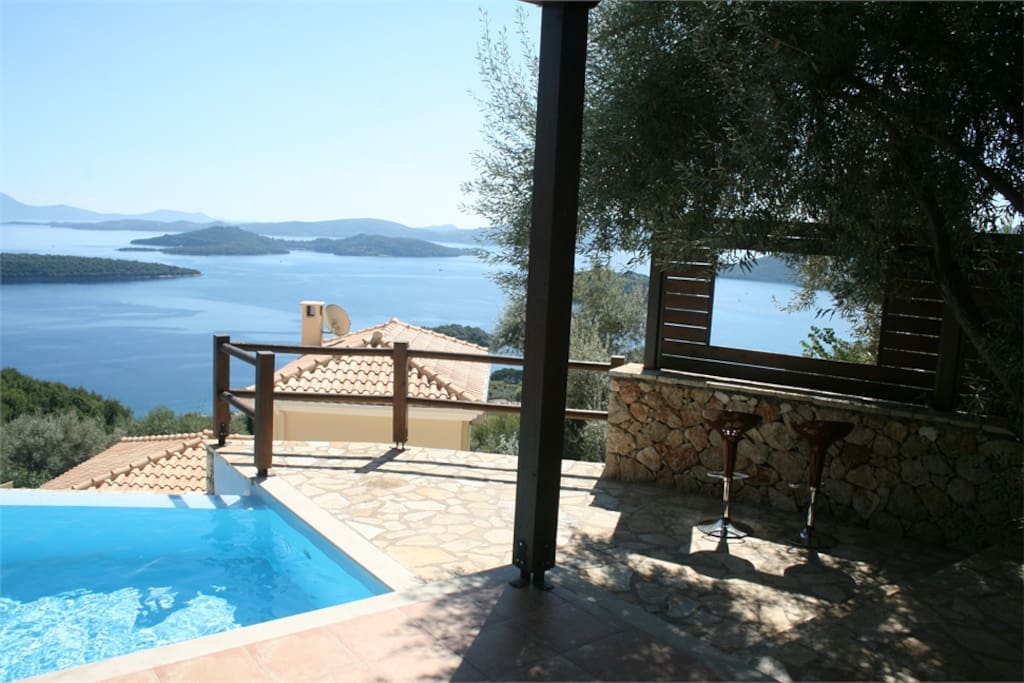 Read a book, drink wine or eat fresh Greek food on a terrace overlooking the bay of Nidri.