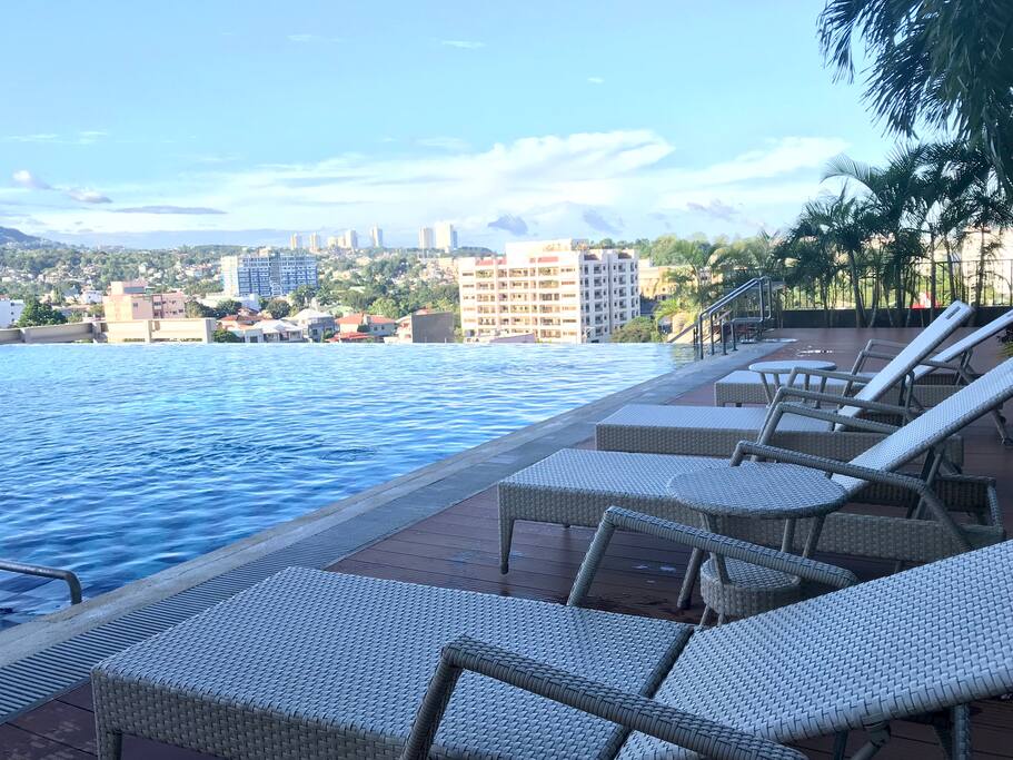 Lounge and relax by the poolside and watch the sunset.