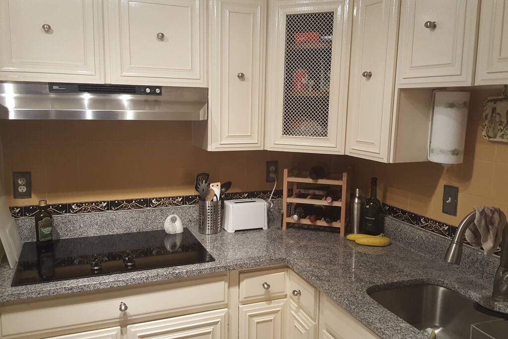 Large kitchen area with everything you need to cook