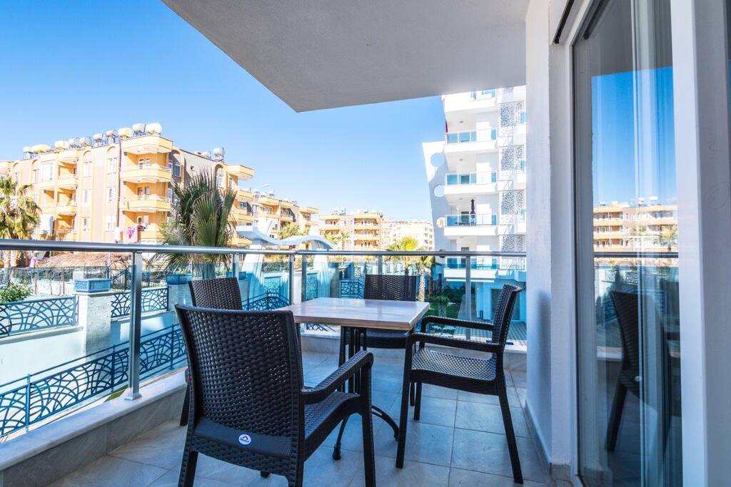 Large balcony with poolside view