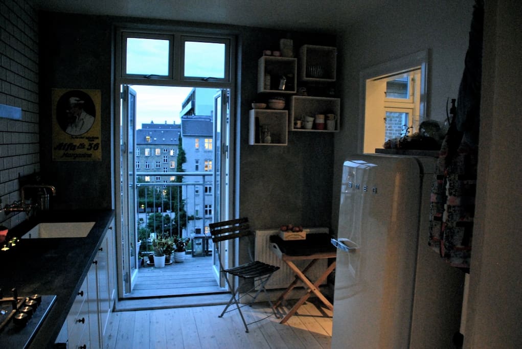 Next to the balcony is the kitchen.