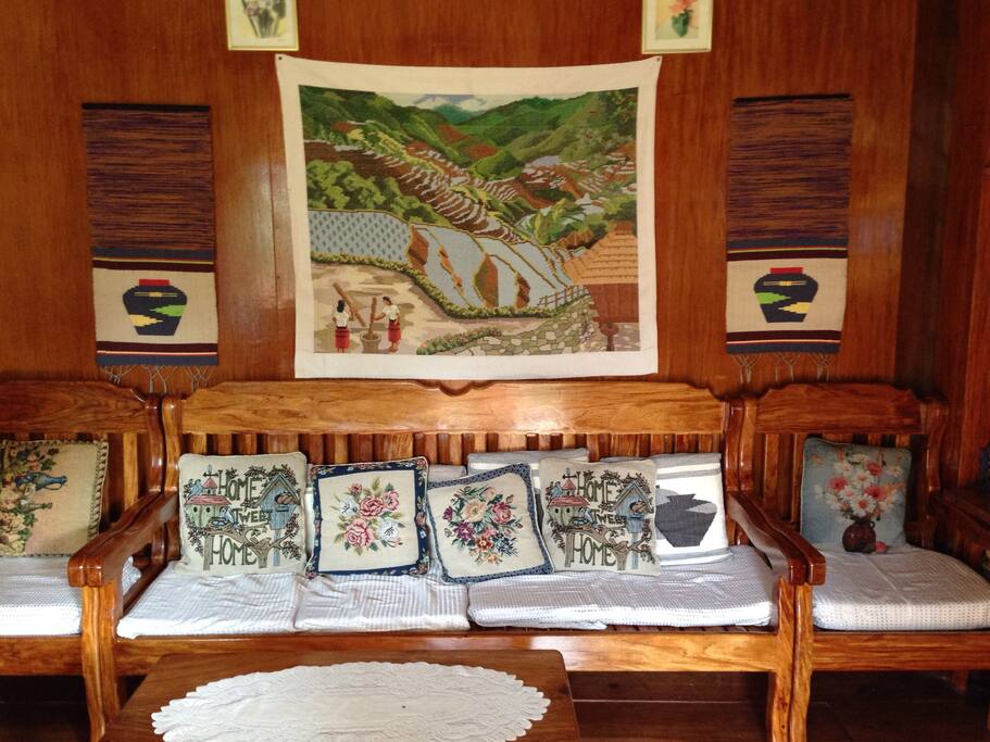 Sitting room overlooking mini rice terraces through glass door