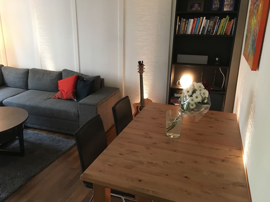 Big dining table and comfy couch.